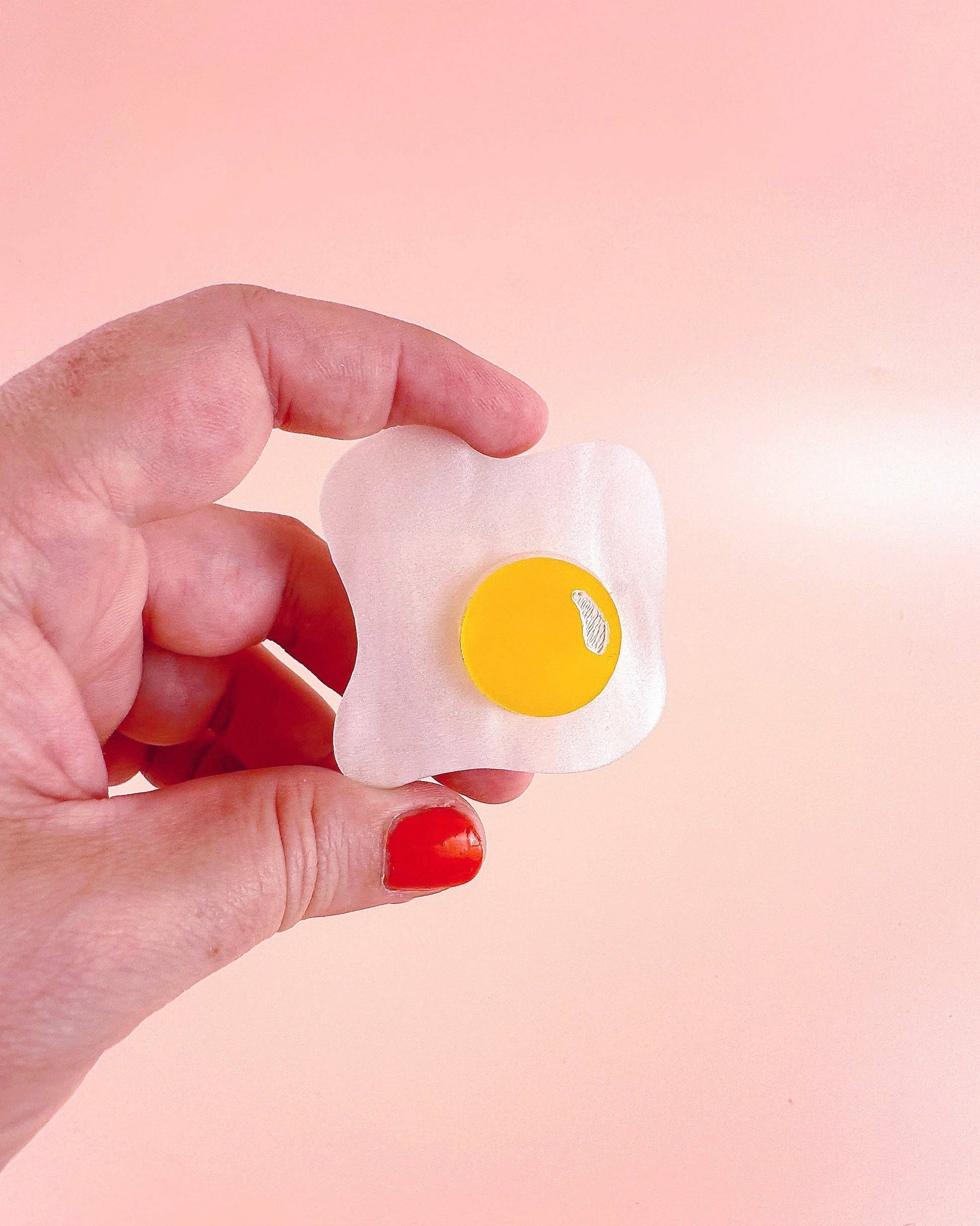 Over easy egg pop-up ruler handle