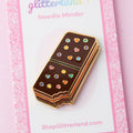 Glitterland | Rainbow Brownie Needle Minder