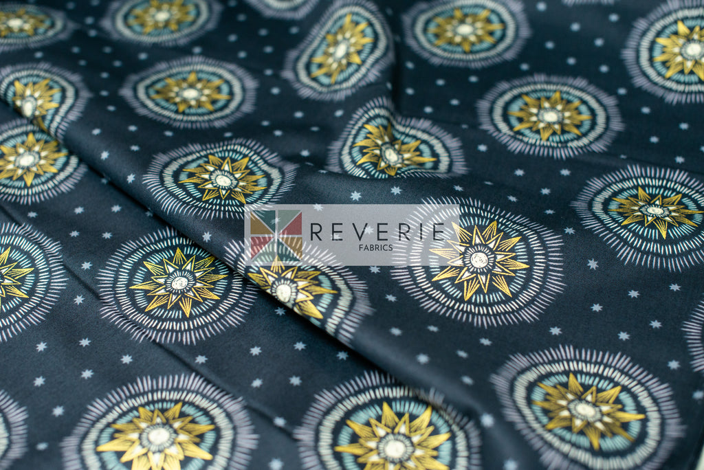 Lewis & Irene | Winter Solstice | Winter solstice sun star on midnight blue (with gold metallic) - L60C