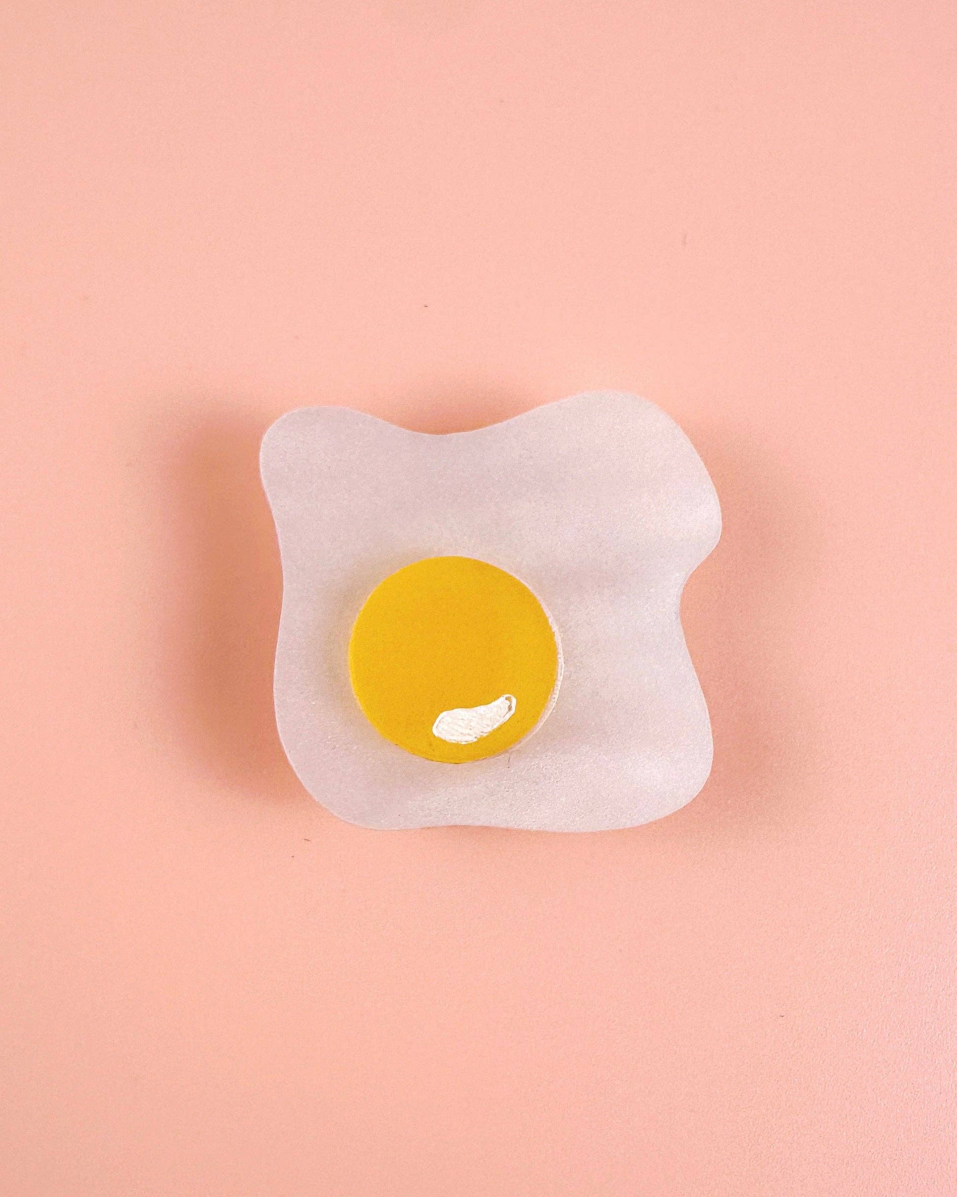 Over easy egg pop-up ruler handle